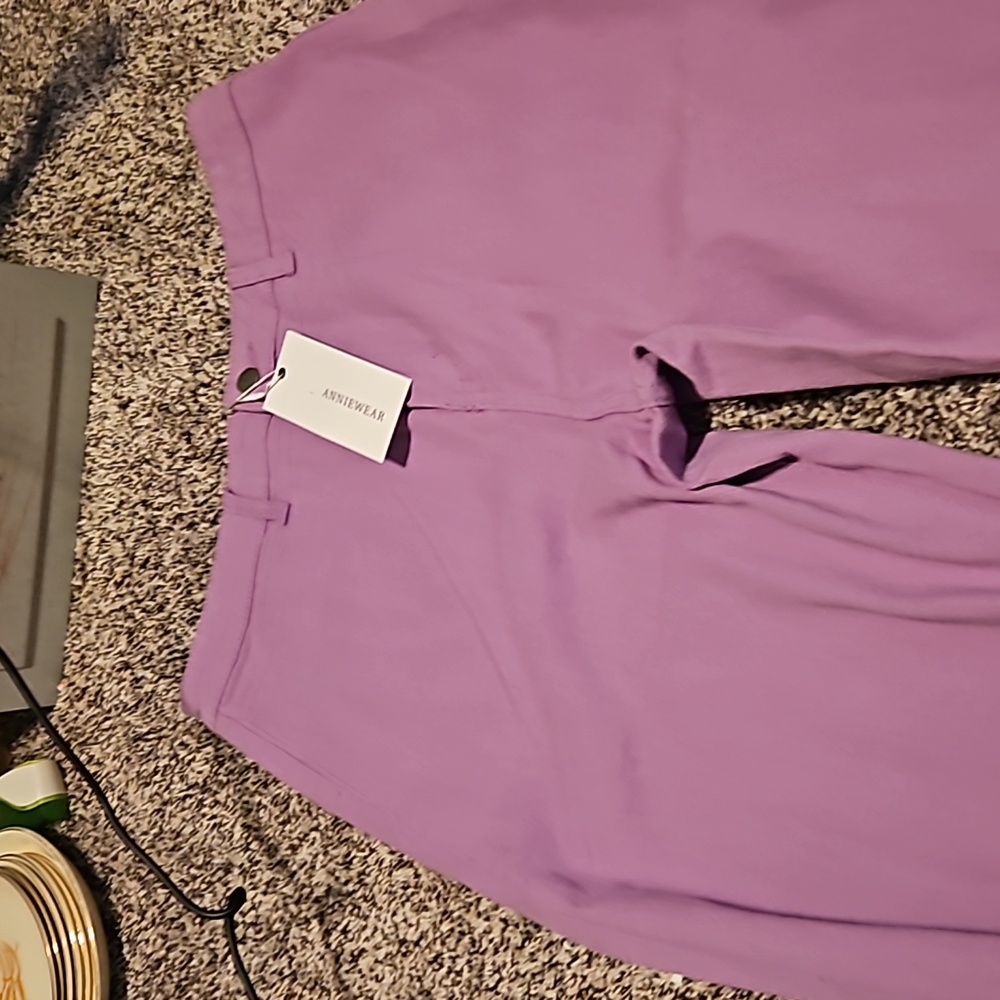 Anniewear. Size women's XL. Light purple jeans. Unfinished bottom with tag.